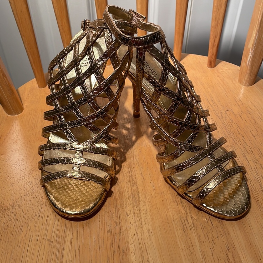 Michael Kors beautiful gold shoes. Never worn still with sticker tag 8M
